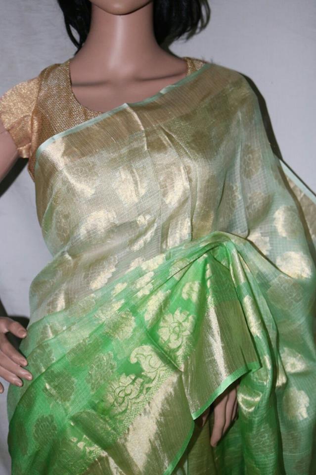 GREEN SHADED SILK KOTA SAREE WITH SELF WEAVED DESIGN.