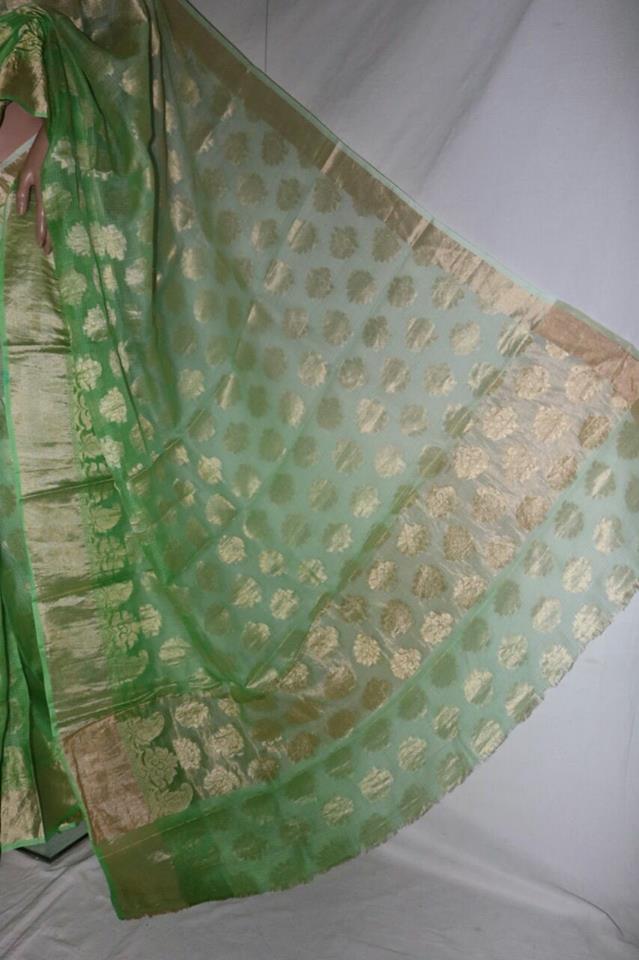 GREEN SHADED SILK KOTA SAREE WITH SELF WEAVED DESIGN.