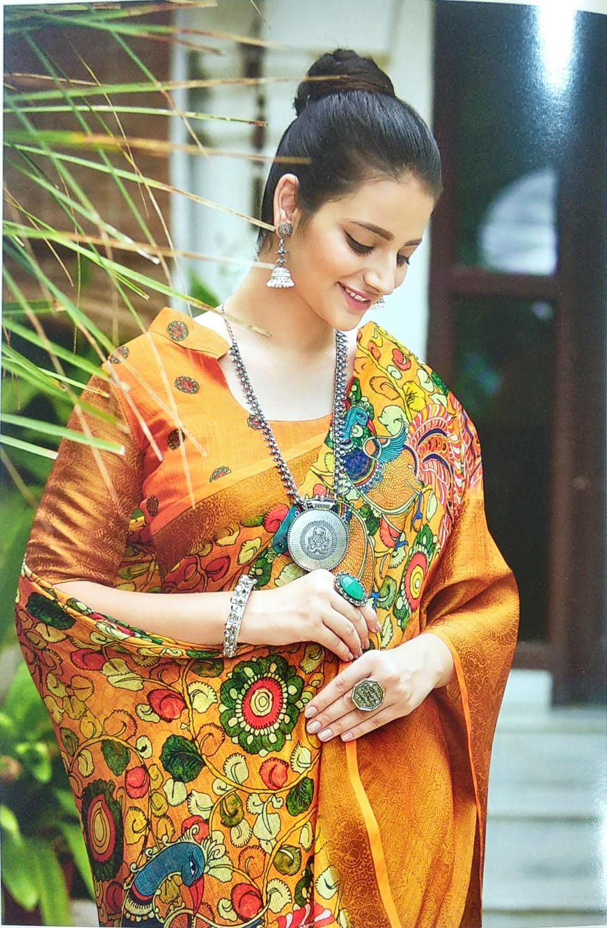 ORANGE COLOR LINEN WITH KALAMKARI PRINTED SAREES.