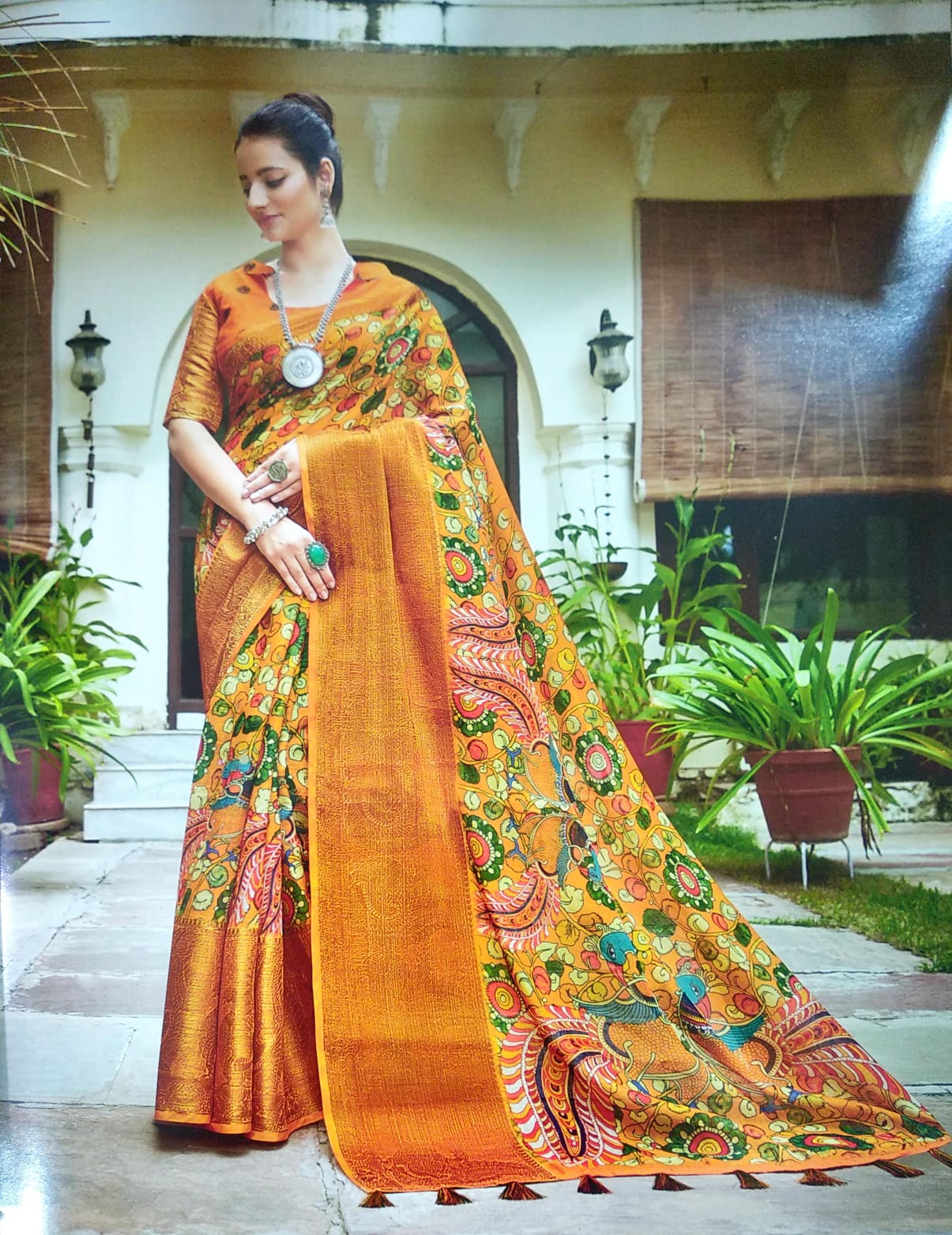 ORANGE COLOR LINEN WITH KALAMKARI PRINTED SAREES.