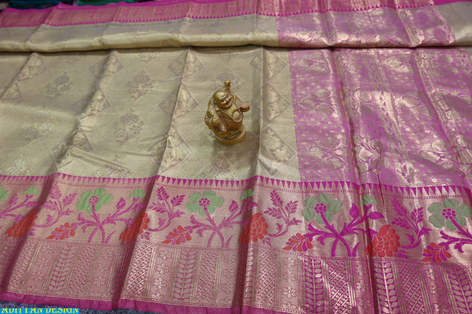 GOLD COLOR KANCHI PATTU FANCY SAREE.