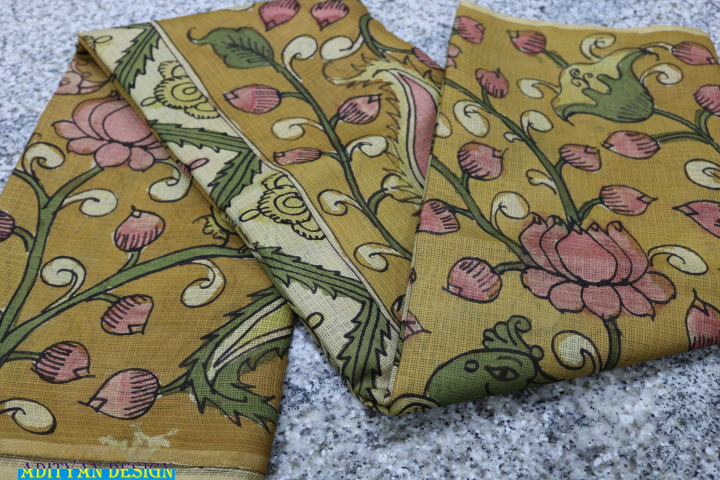 MUSTERED YELLOW COLOR PURE SILK KOTA WITH PEN KALAMAKRI WORK.